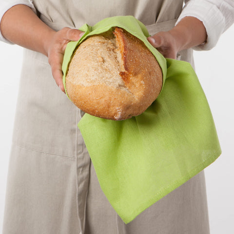 Now Designs flour sack towels draped over a bowl for dough proofing