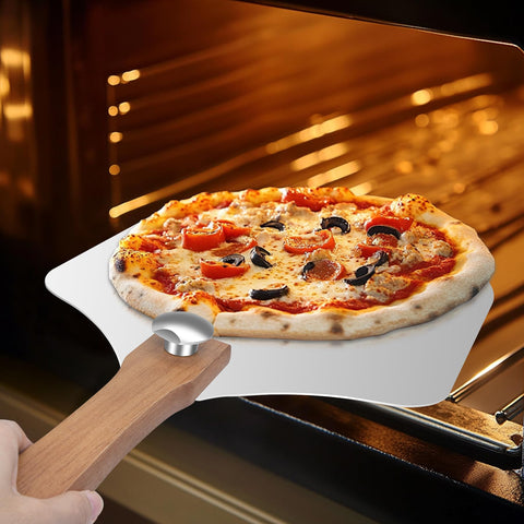 Nsoyos pizza peel set includes rocker cutter and server for easy slicing and serving