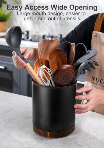 Nucookery ceramic utensil holder with cork bottom protecting counter surfaces.