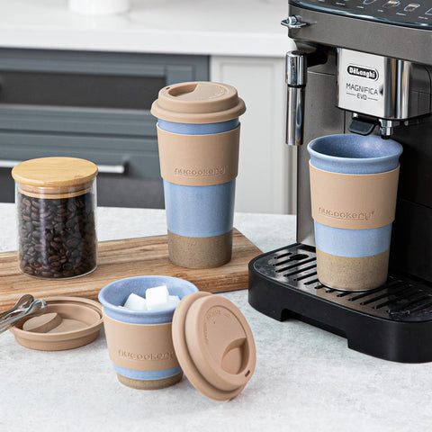 Nucookery silicone lid travel mug with sip opening to prevent spills