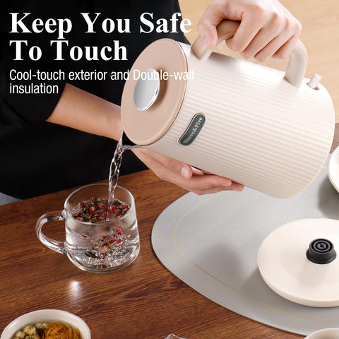 Nueve&Five cream-white kettle on kitchen counter blends style and function.