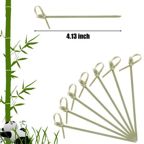 Nuogo bamboo picks with green loop-top design for party presentation.