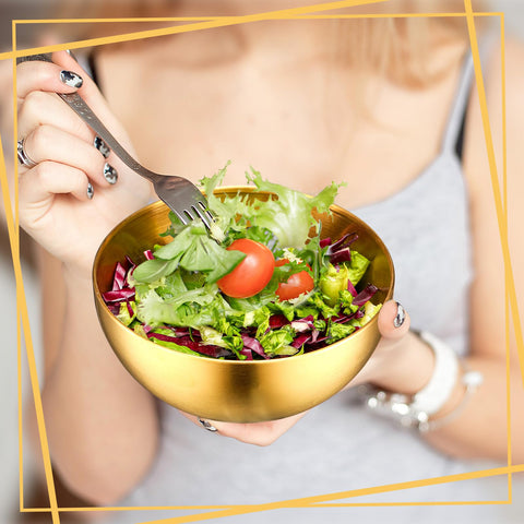 Nuogo gold bowls with smooth edge design for easy handling.