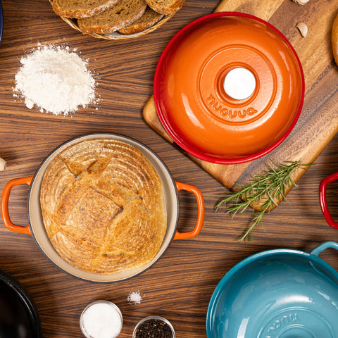 Nuovva enamelled Dutch oven presented on table with elegant black finish