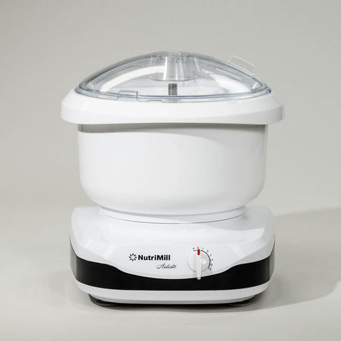 Nutrimill Artiste stainless drive and 1-year warranty.