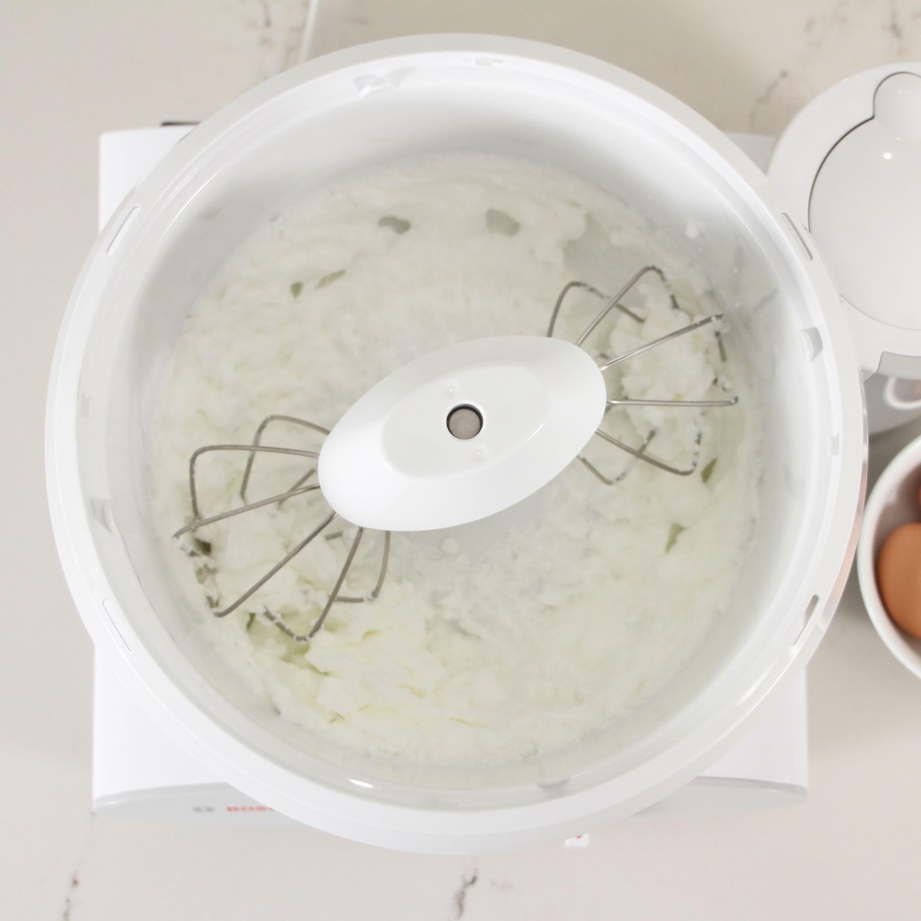NutriMill dough hook extender boosts dough capacity with attachments.
