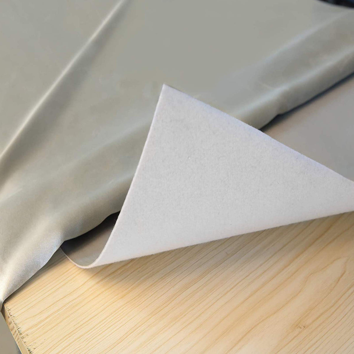 Nuvantee revolutionary table pad 52x108 lies flat to protect surfaces.