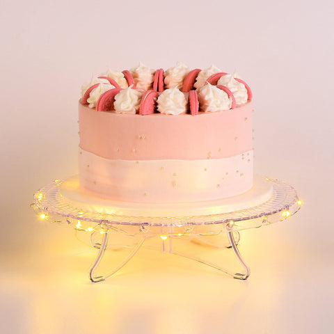 NWK 12-inch lighted cake stand with string lights for elegant wedding cake display.