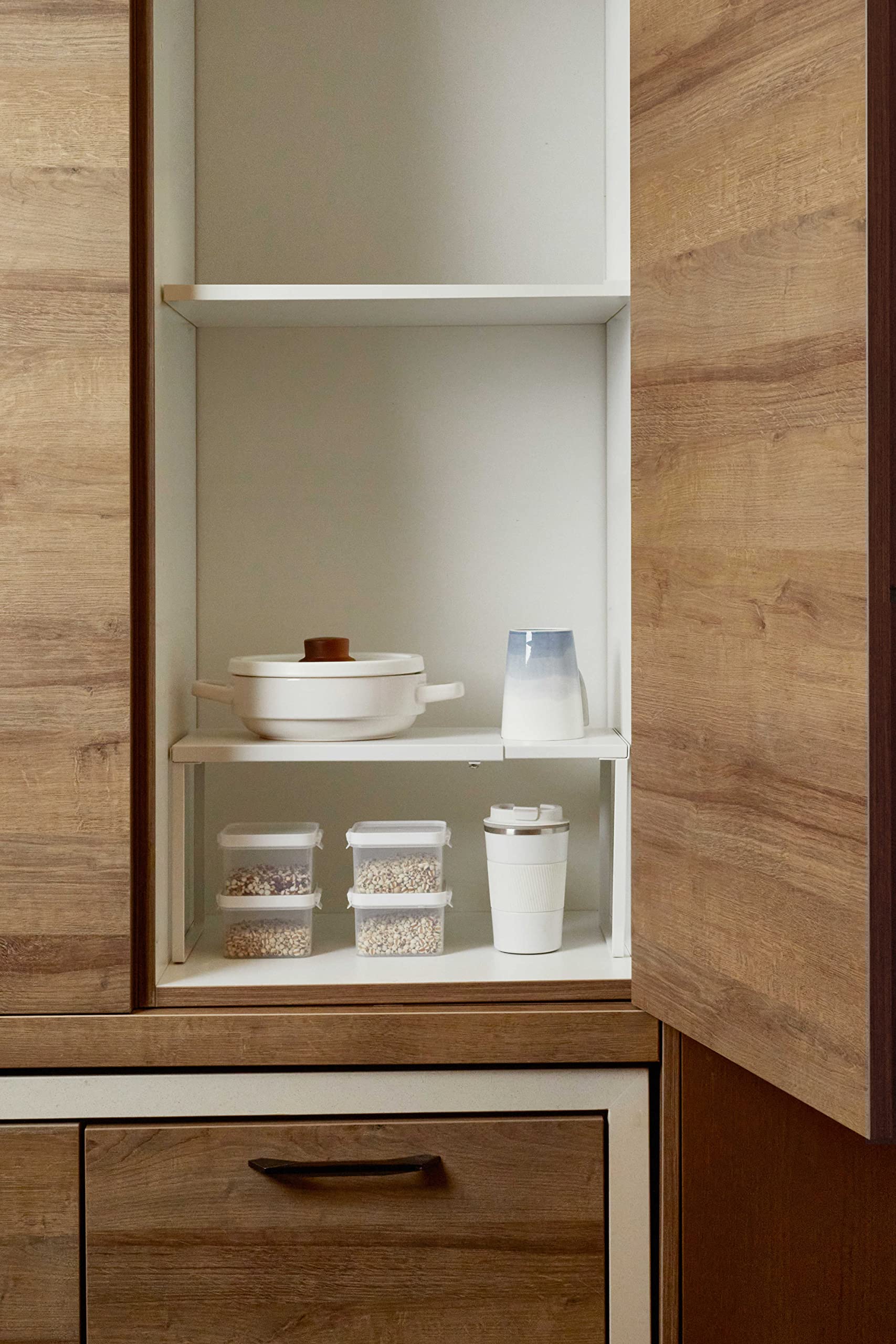 Nxconsu cabinet shelf in multiple rooms for versatile storage needs.