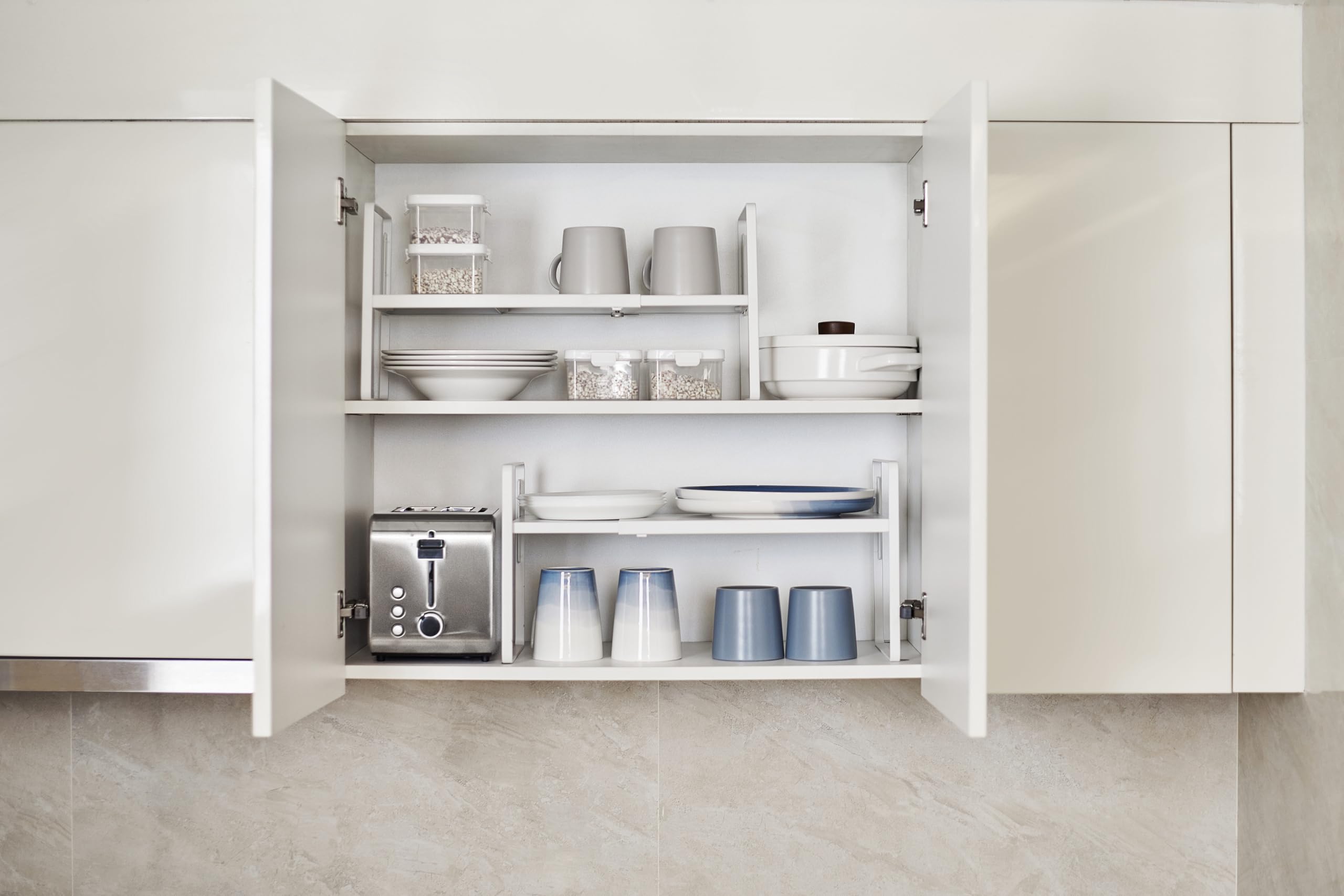 Nxconsu height-adjustable shelf shows three height settings for customizable cabinet clearance.