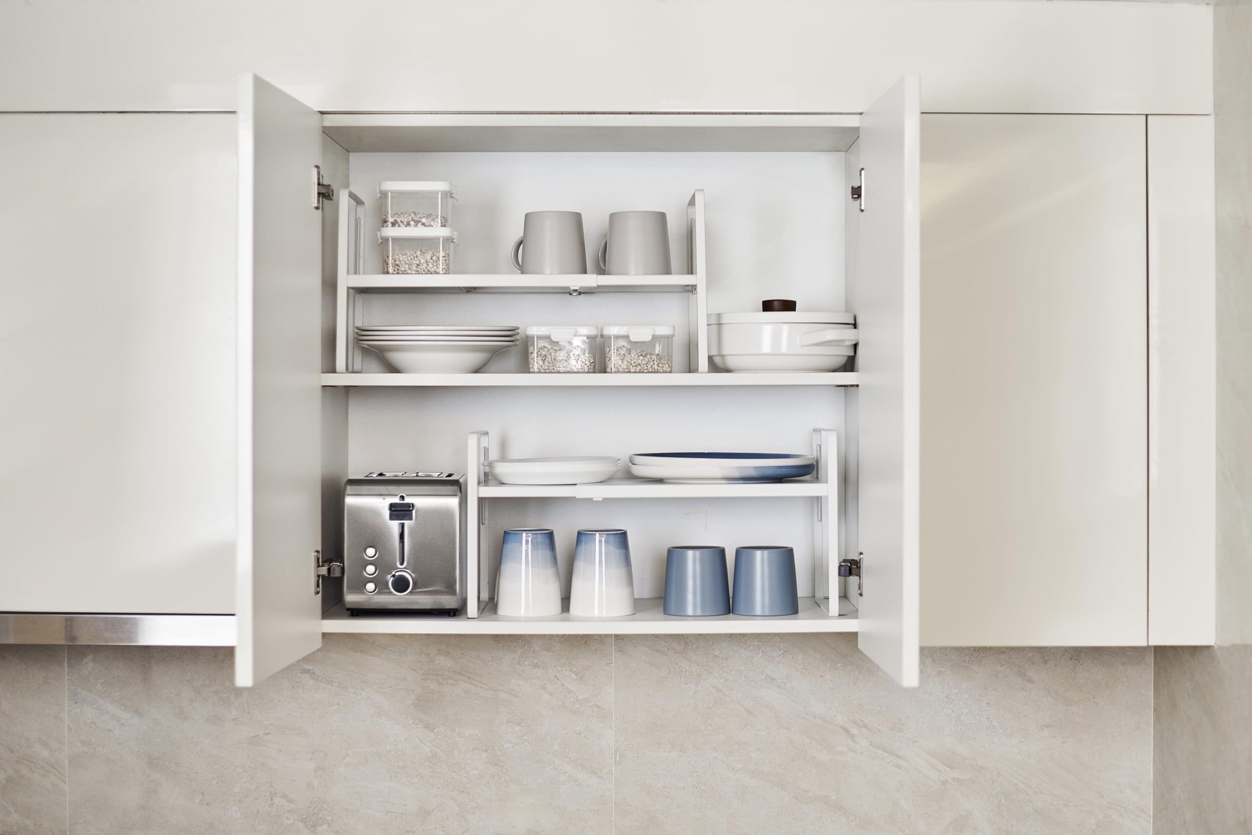 Nxconsu height-adjustable shelf offers three levels to optimize vertical space.
