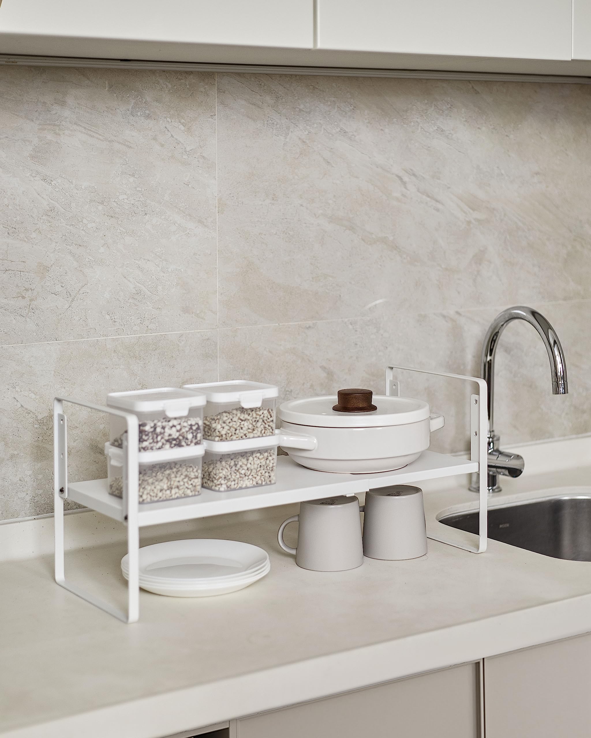 Nxconsu space-saving organizer keeps desktops and cupboards tidy.