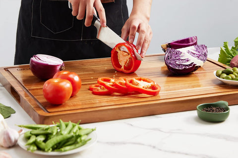 OAKSWARE with built-in handles for easy carving and serving.