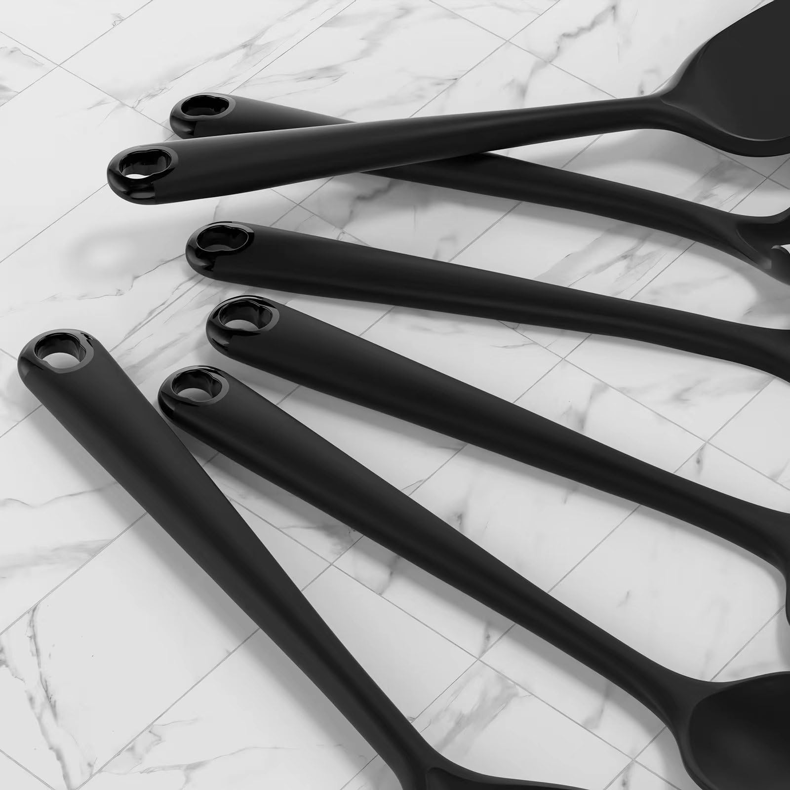 oannao silicone slotted spoon drains efficiently without scratching