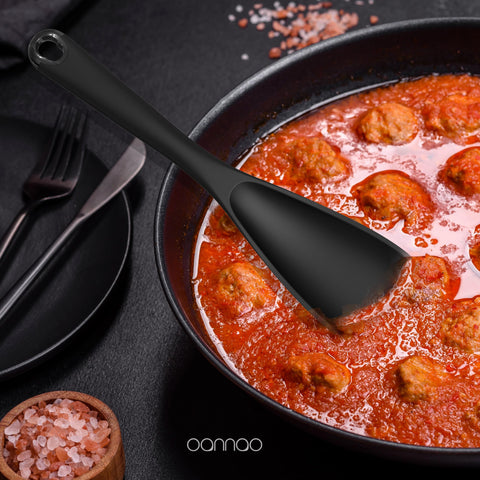 oannao silicone spoon in black for stirring sauces and desserts