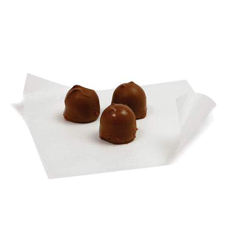 Oasis Supply semi-translucent patty paper showing treats during wrapping.