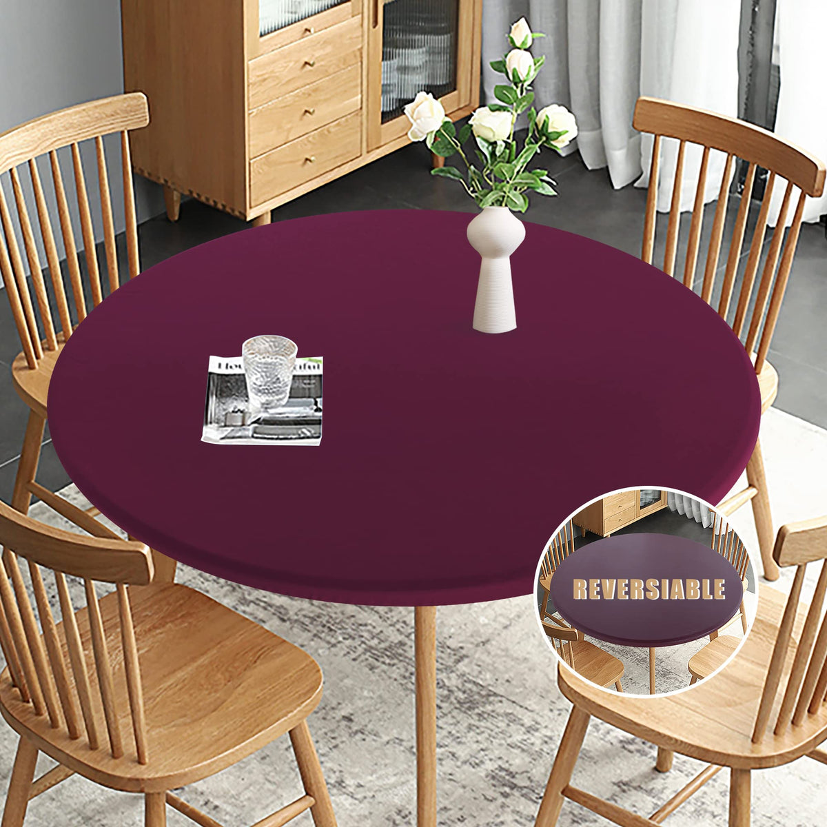 Obstal burgundy round-tablecloth on table showing effortless stretch fit for secure indoor use.