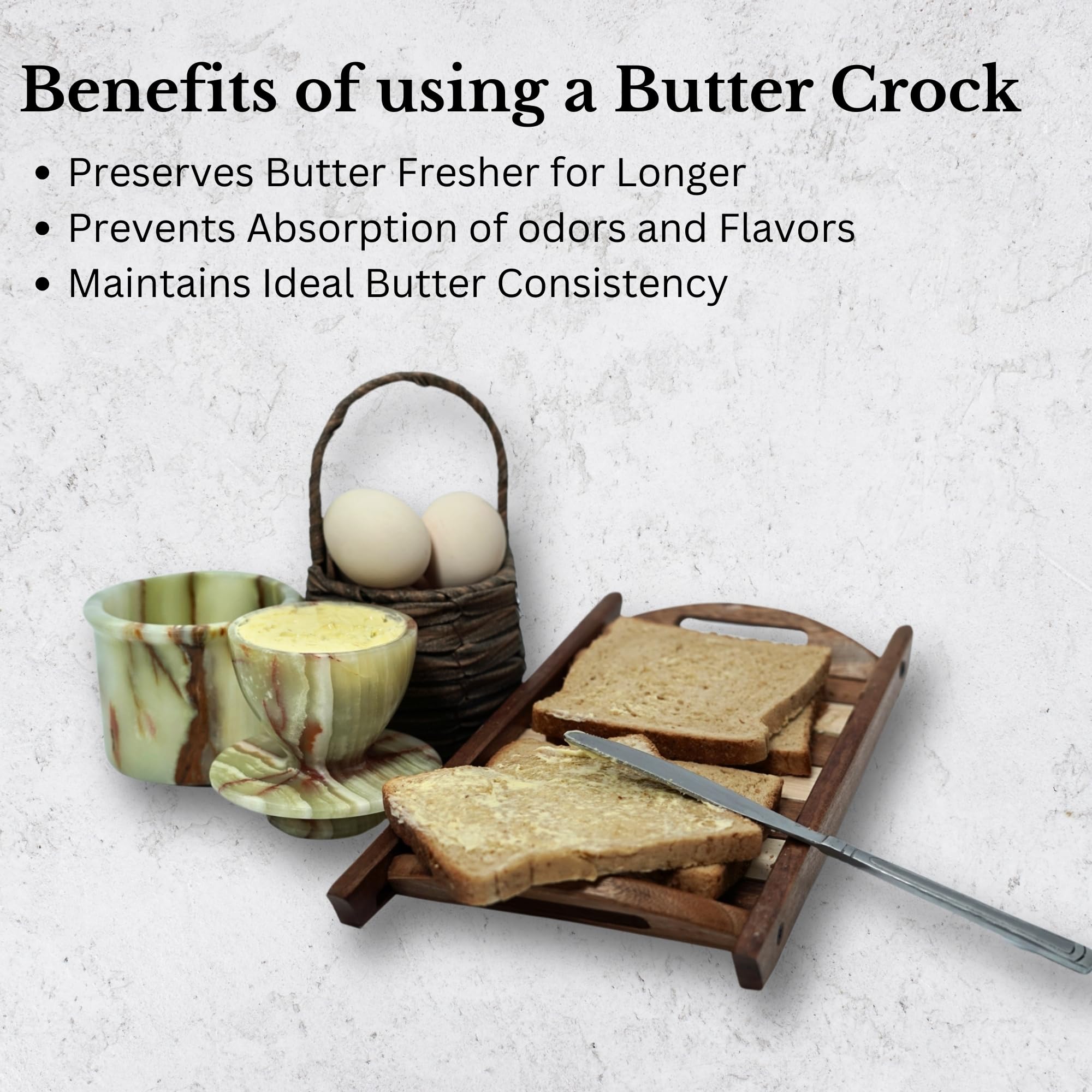 Butter dish on counter top keeps butter soft and easily spreadable.