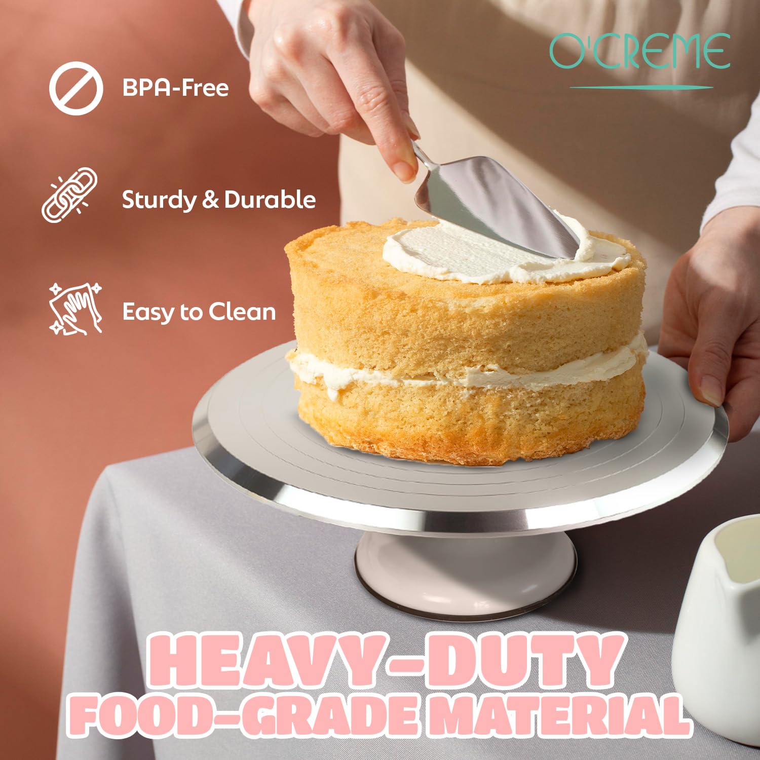 O’CREME turntable textured decorating surface reduces shifting during icing.
