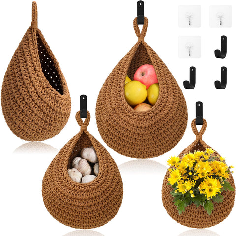 OGOTEZ hanging fruit baskets 3-pack on wall for organized kitchen storage.