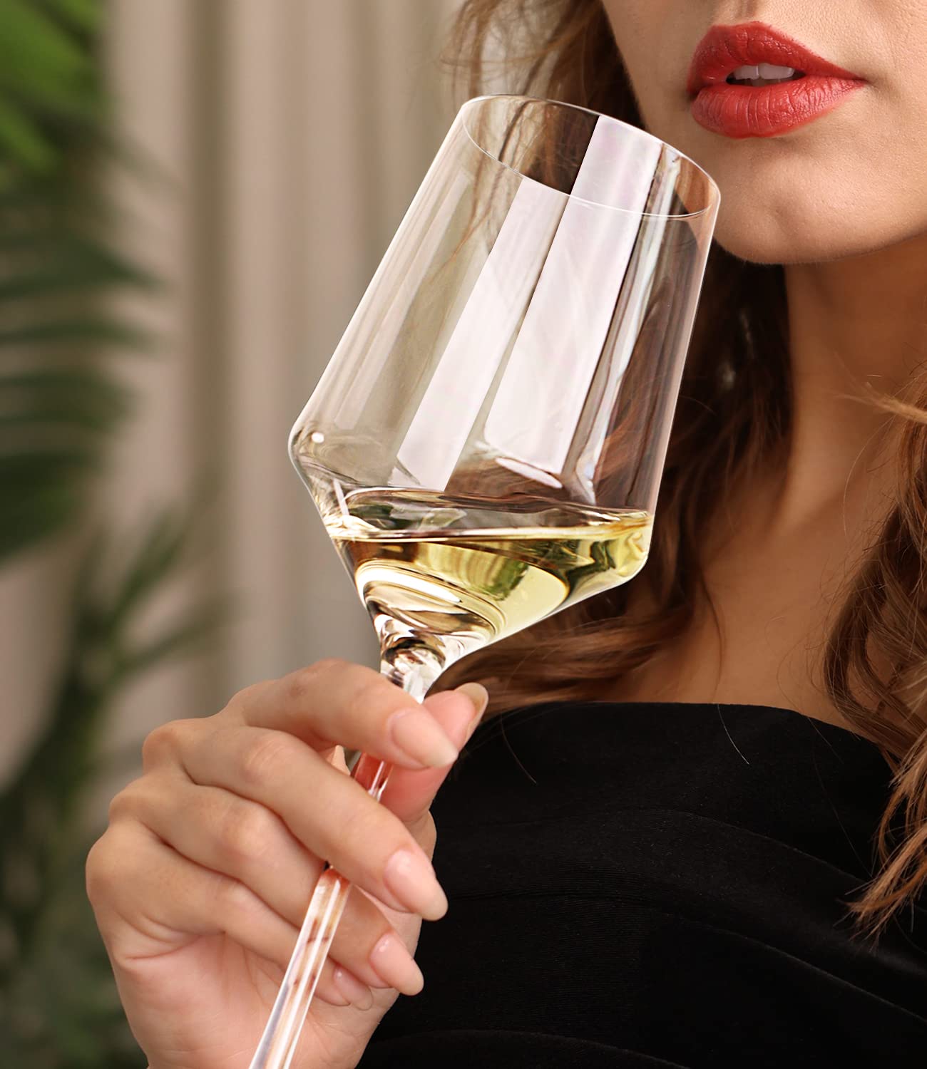 OJA hand-blown crystal wine glasses showcase clarity and elegance for special dinners.