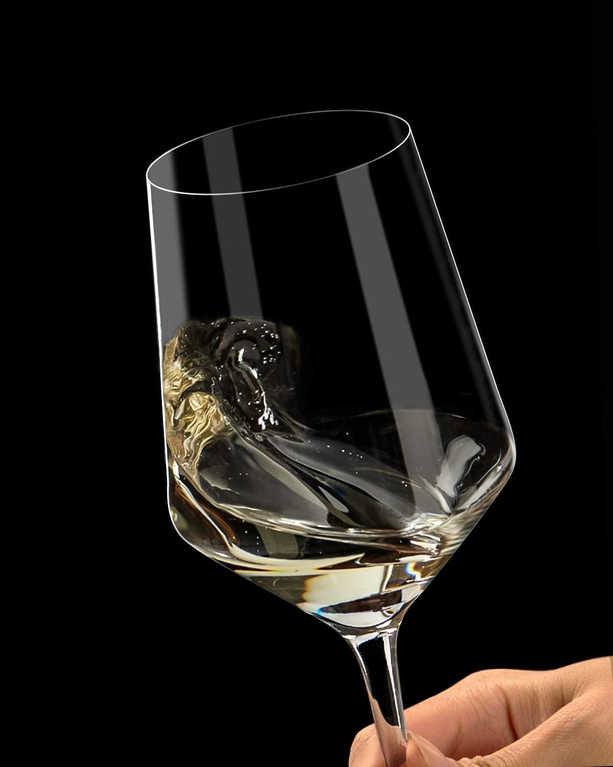 OJA hand-blown red wine glasses detail, seamless stem, precision craftsmanship enhances a refined pour