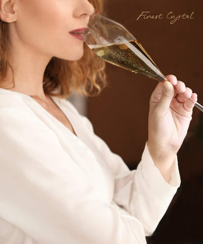 OJA tulip-design champagne glass enhances aroma and bubbles.