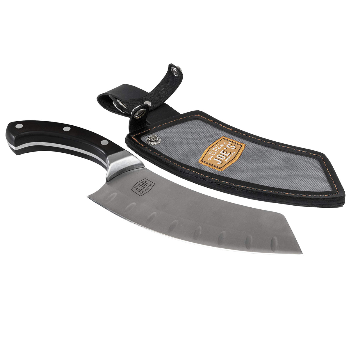 Oklahoma Joe's Blacksmith cleaver blade close-up shows a sharp edge for precise cuts.