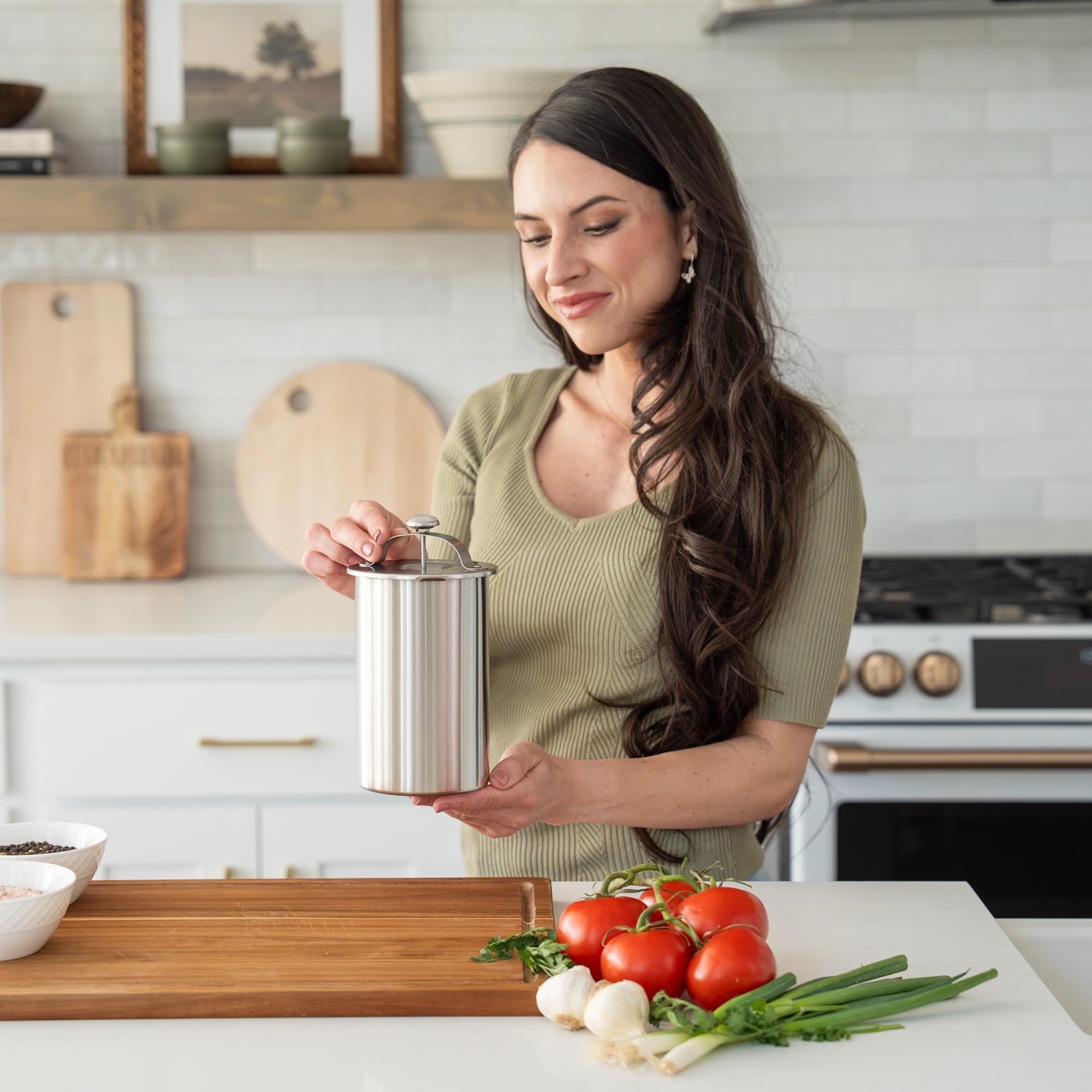 OLEEX compact stainless steel press fits small kitchens without sacrificing versatility.