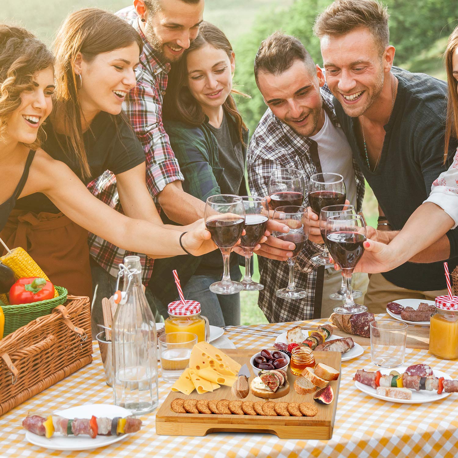 Olebes bamboo charcuterie setup pairs with wine and fresh fruit