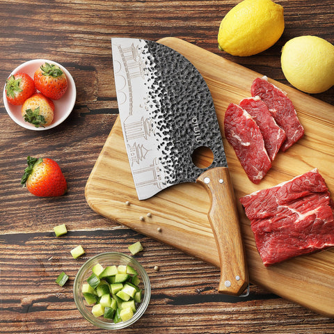 OLULU knife set packaging on rustic wooden block display.