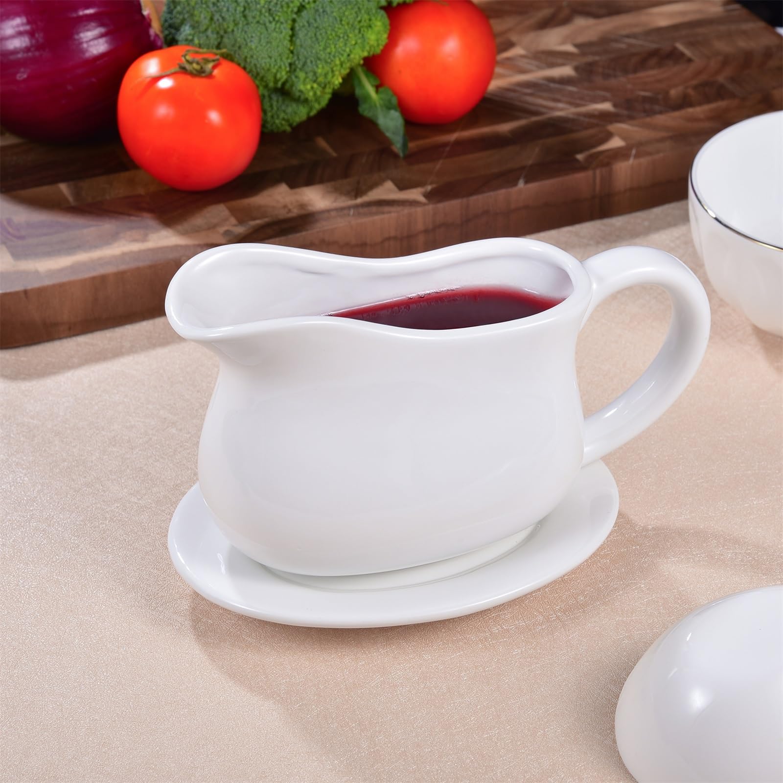 Omesata snow porcelain with glossy finish adds timeless dining style