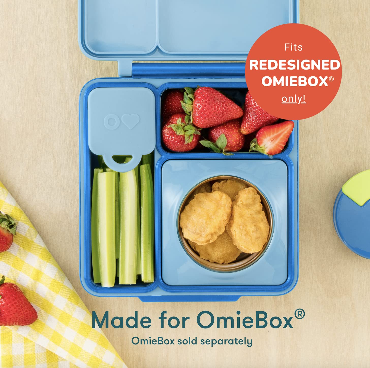 OmieBox dip container blue-lime close-up highlighting flexible silicone.