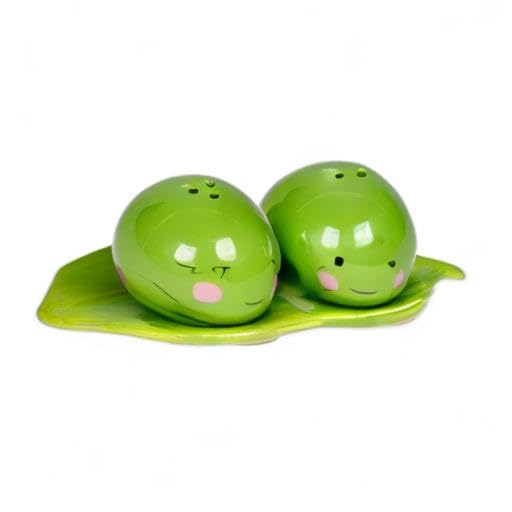 One Hundred 80 Degrees green ceramic shakers brighten casual dinners and gatherings.