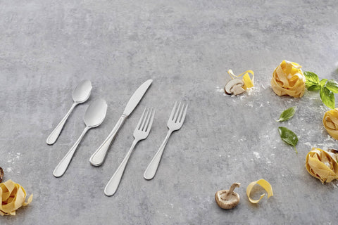 Oneida Flight flatware arranged for a relaxed dining table