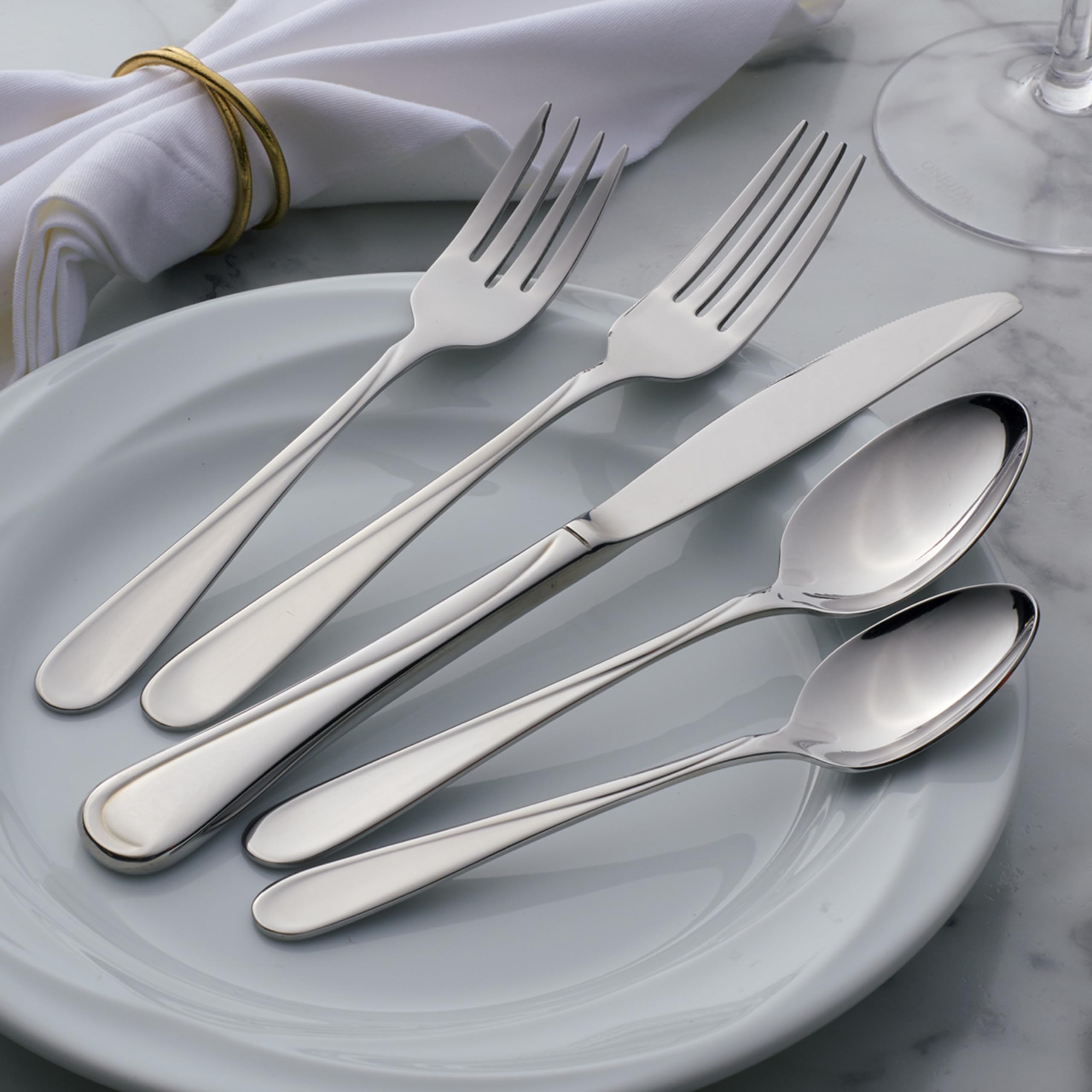 Oneida Flight teaspoons on a place setting elevating casual meals.