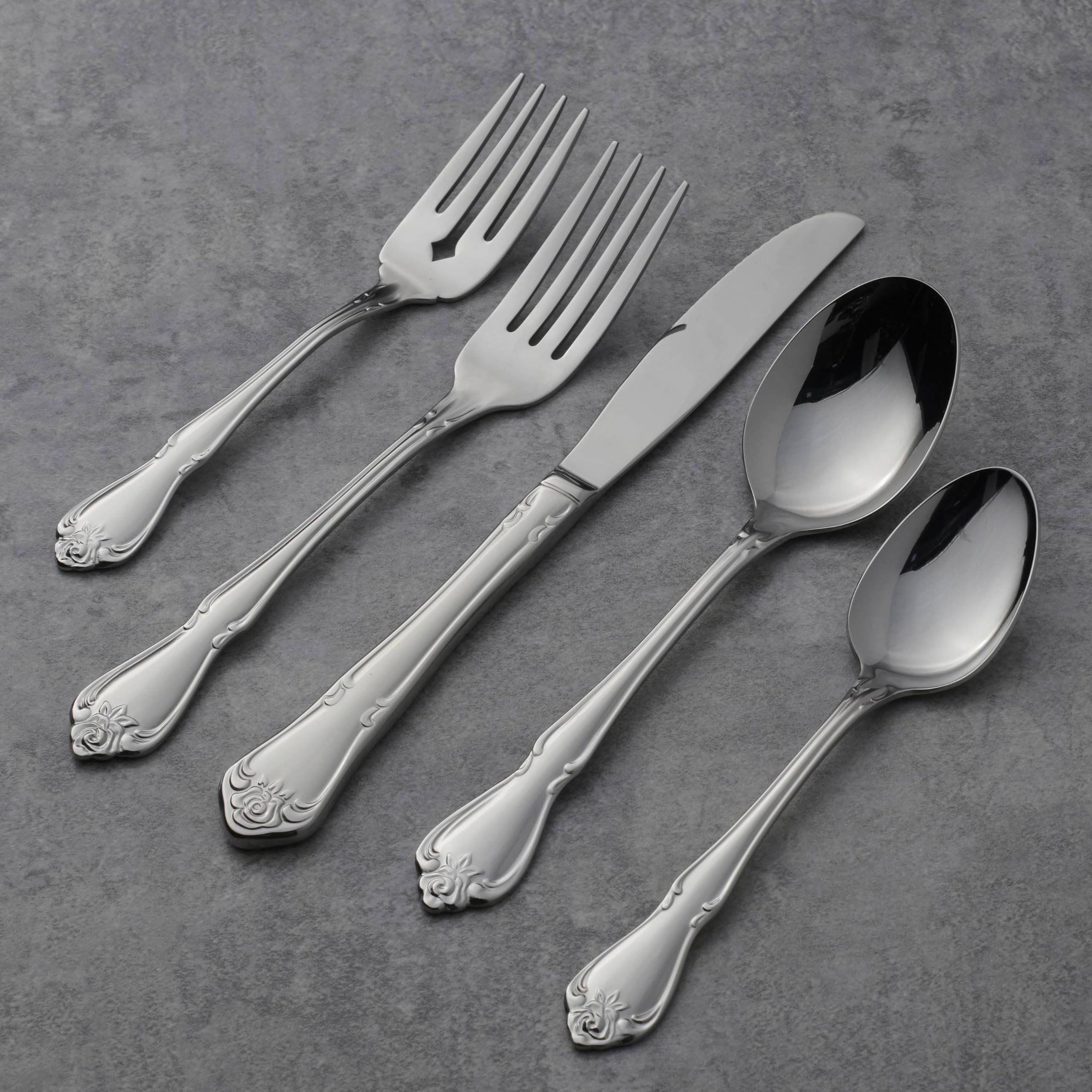Oneida True Rose set of four teaspoons for casual meals and gatherings.