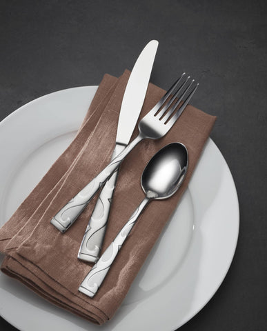 Oneida Tuscany serving pieces include spoons and meat fork for entertaining