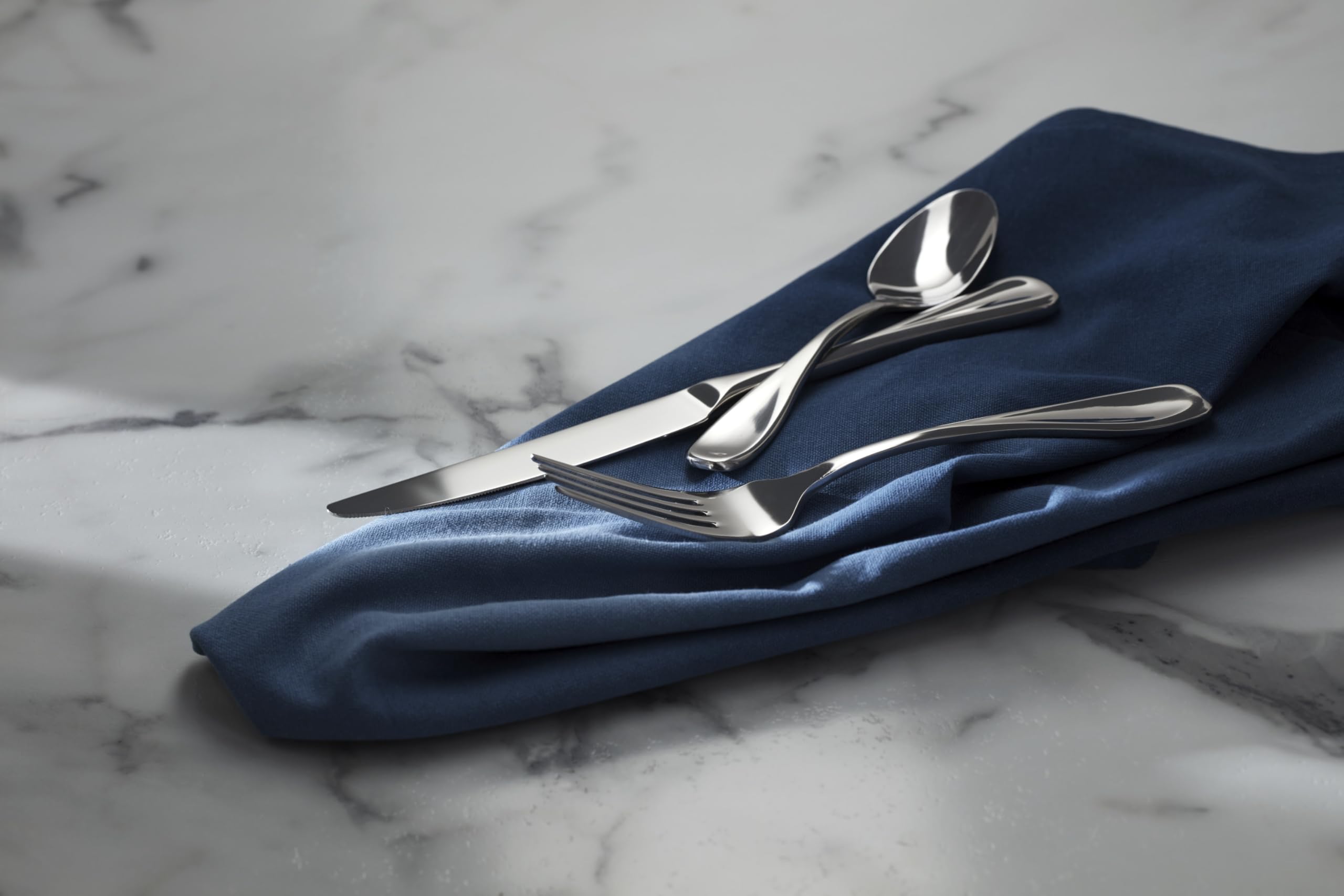 Oneida Voss mirror finish reflects light for a polished table setting