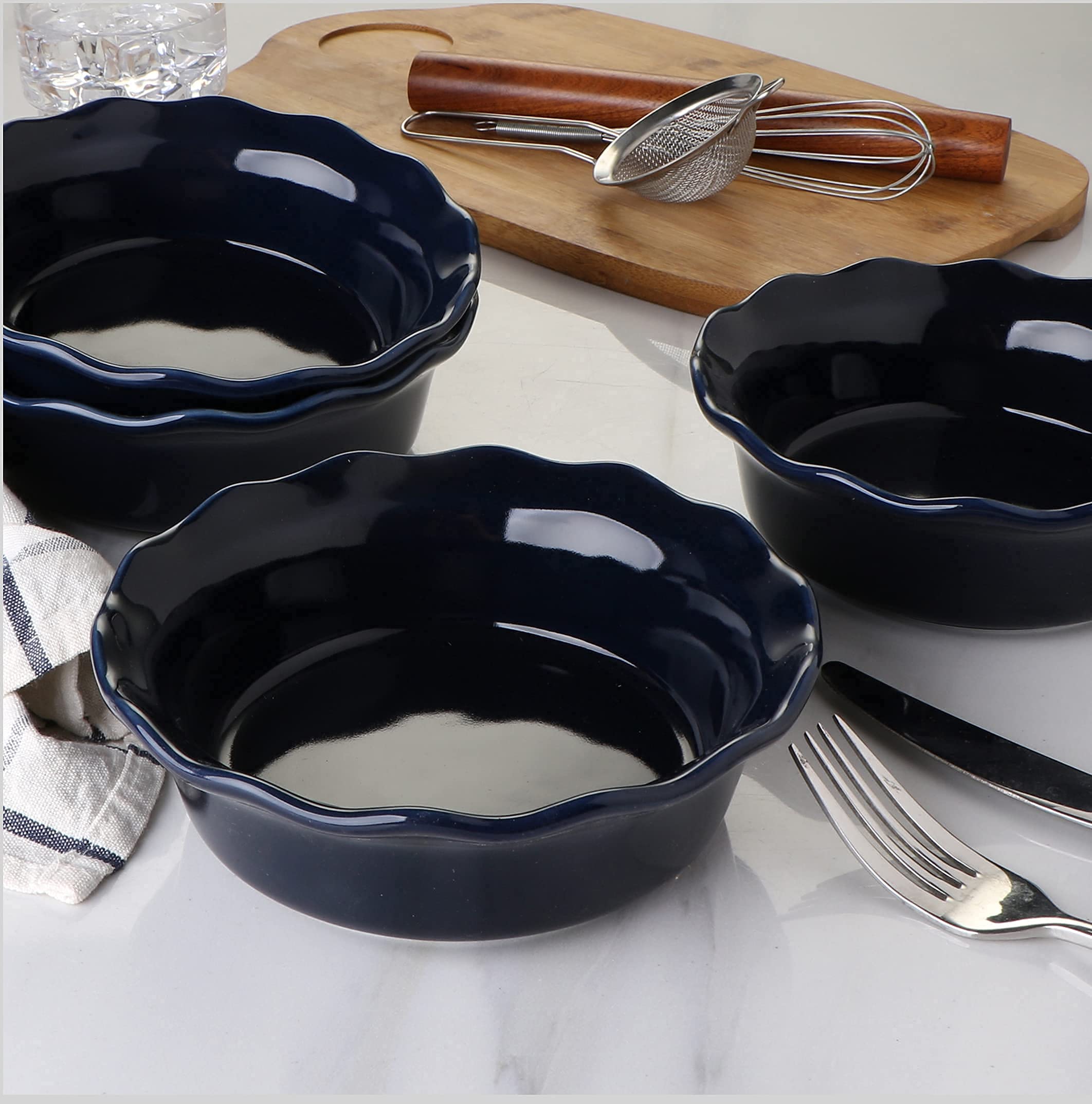 ONEMORE Pie Pans stacked to illustrate organized kitchen storage.