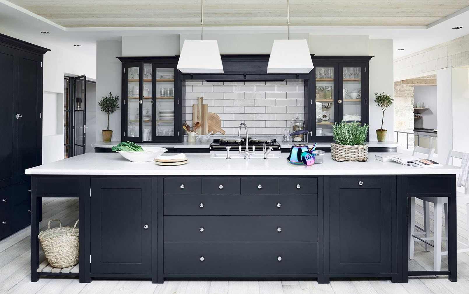 Onlycooker induction-compatible kettle on stove demonstrating versatile heating.