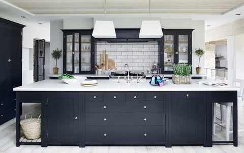 Onlycooker induction-compatible kettle on stove demonstrating versatile heating.