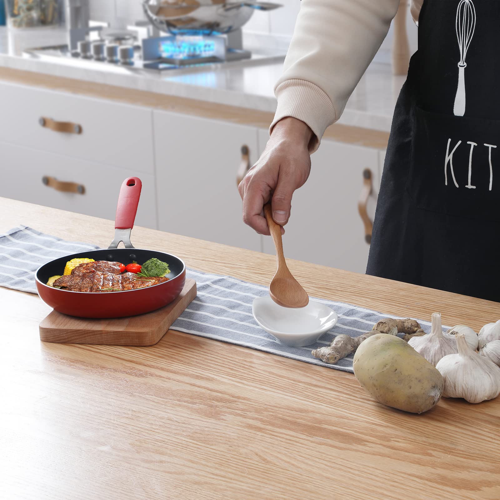ONTUBE spoon rests in a dining setup; clean, elegant, and organized tableware.