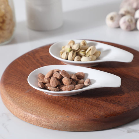 ONTUBE ceramic spoon rest highlighting porcelain material and refined finish.
