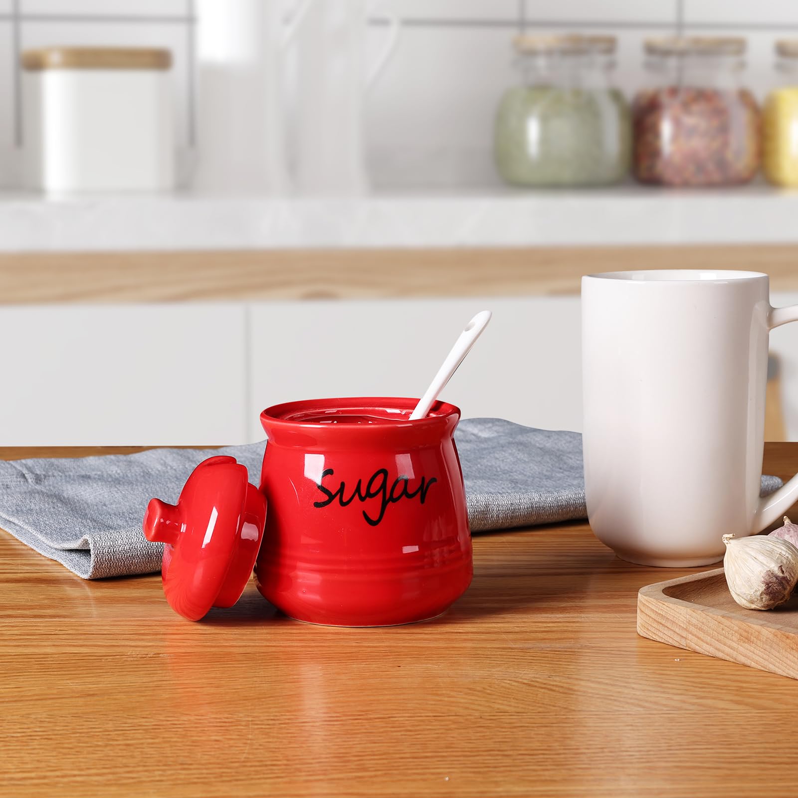 ONTUBE red sugar bowl on a well-set table for guests
