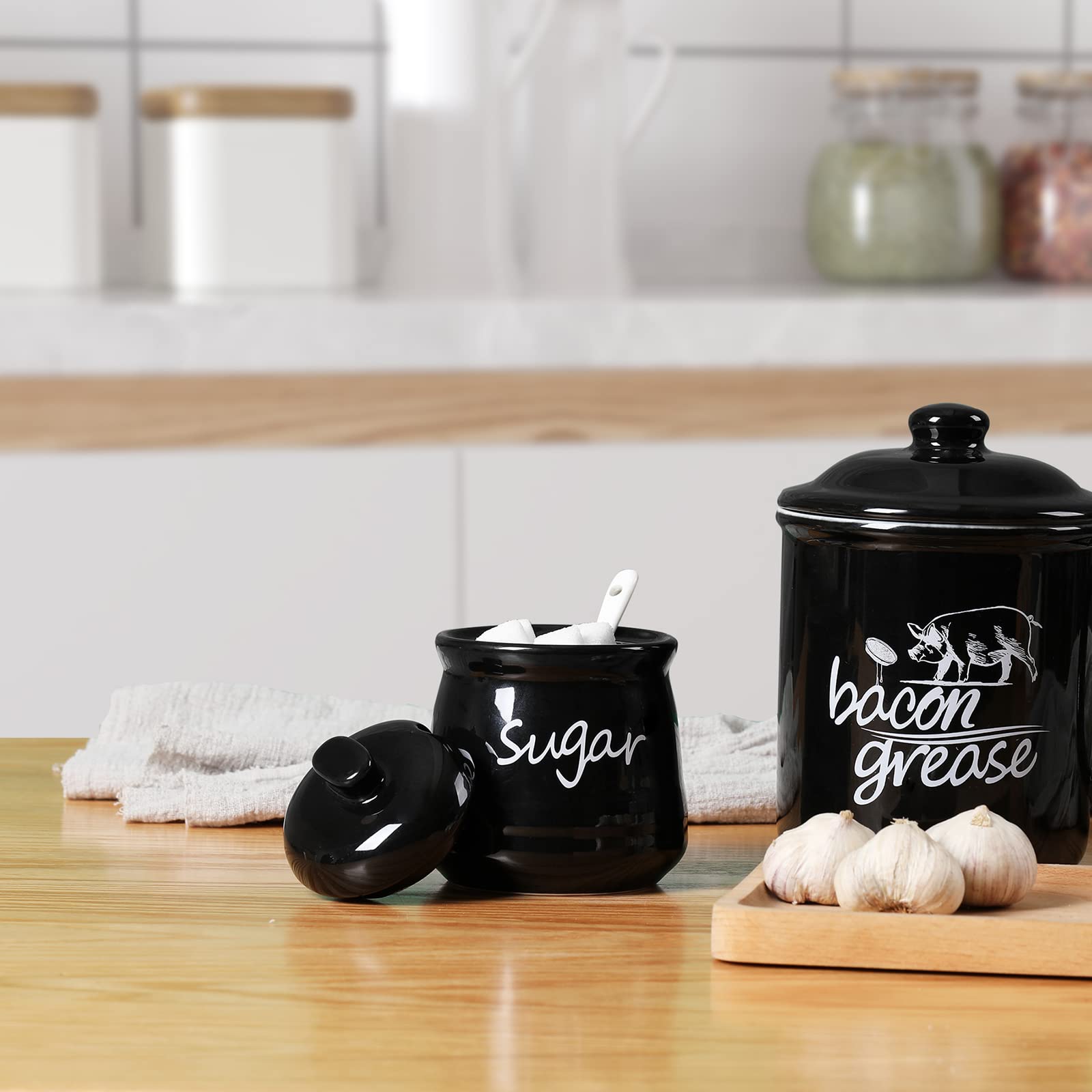 ONTUBE elegant black ceramic sugar bowl complements modern tableware.
