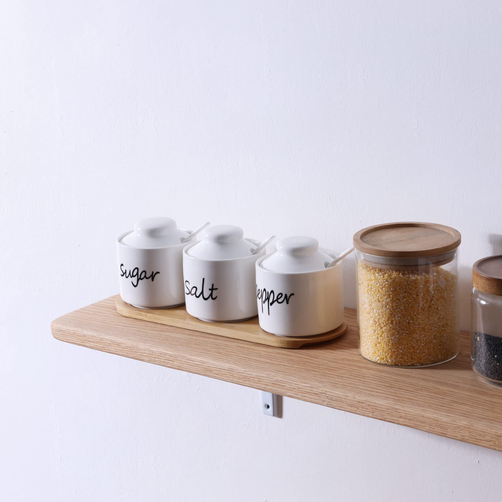 Stylish ONTUBE Farmhouse table setting showing ceramic condiment pots.