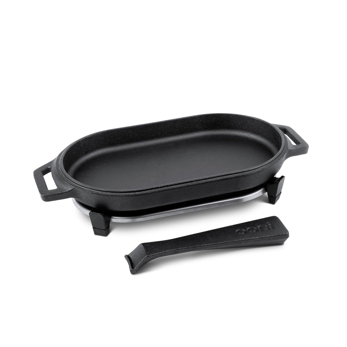 Ooni cast iron Sizzler Pan with stainless steel trivet for safe set-down.