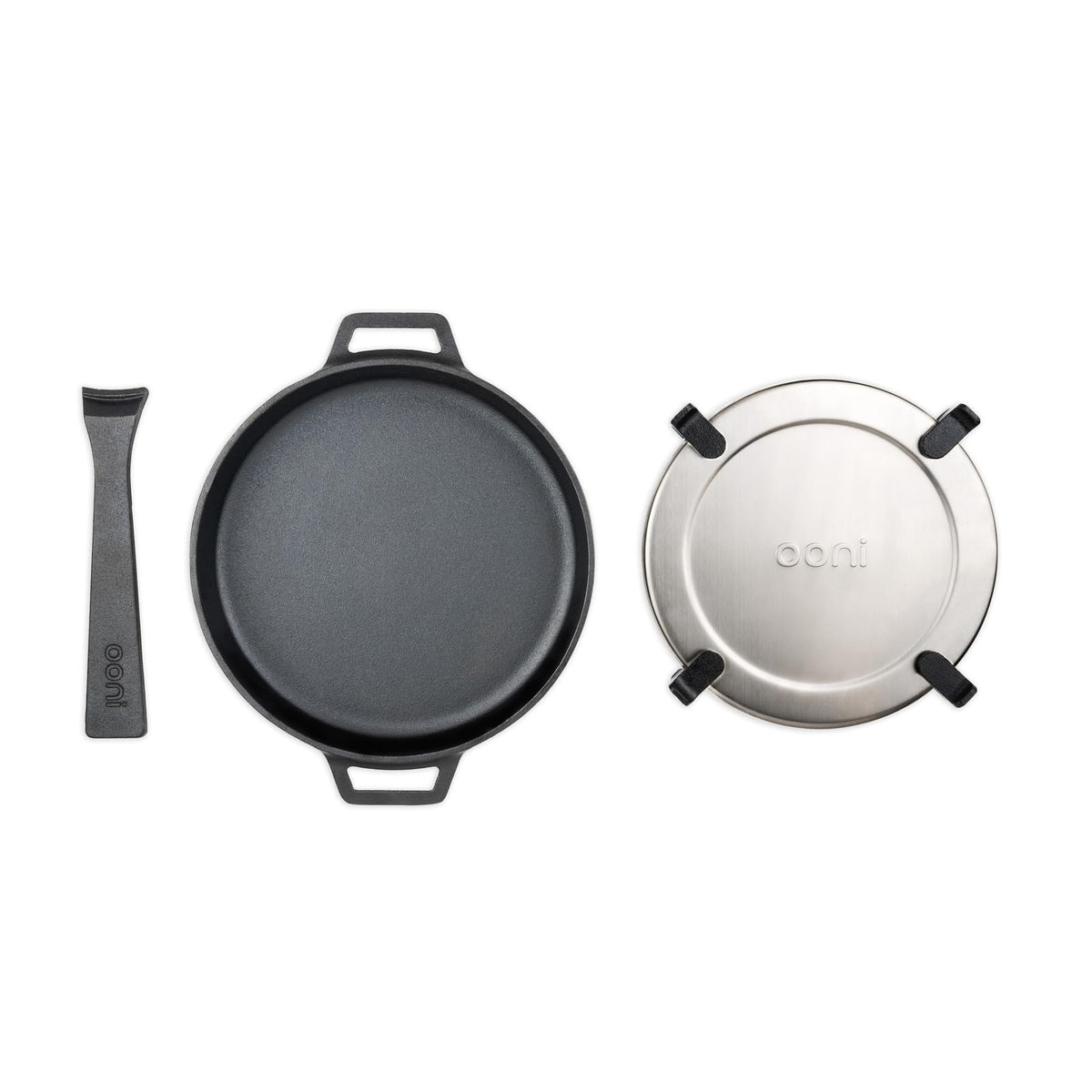 Ooni cast iron skillet 9-inch with removable handle for versatile cooking.