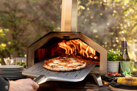 Ooni outdoor oven accessory peel ideal for backyard pizzas.